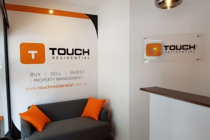 Custom Designed Wallpaper Signage